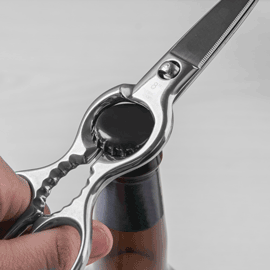 Kitchen scissors as bottle opener